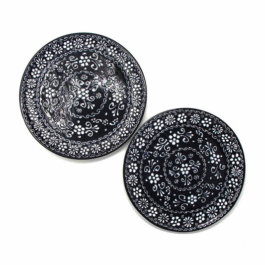 Handmade 11.75-inch Mexican pottery dinner plate set featuring a rich ink-blue glaze, hand-painted by artisans in Guanajuato using traditional ceramic techniques; lead-free, microwave and dishwasher safe.
