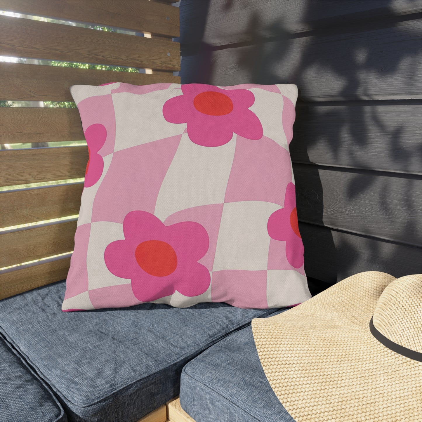 Bright floral patio pillow crafted from water-resistant materials
