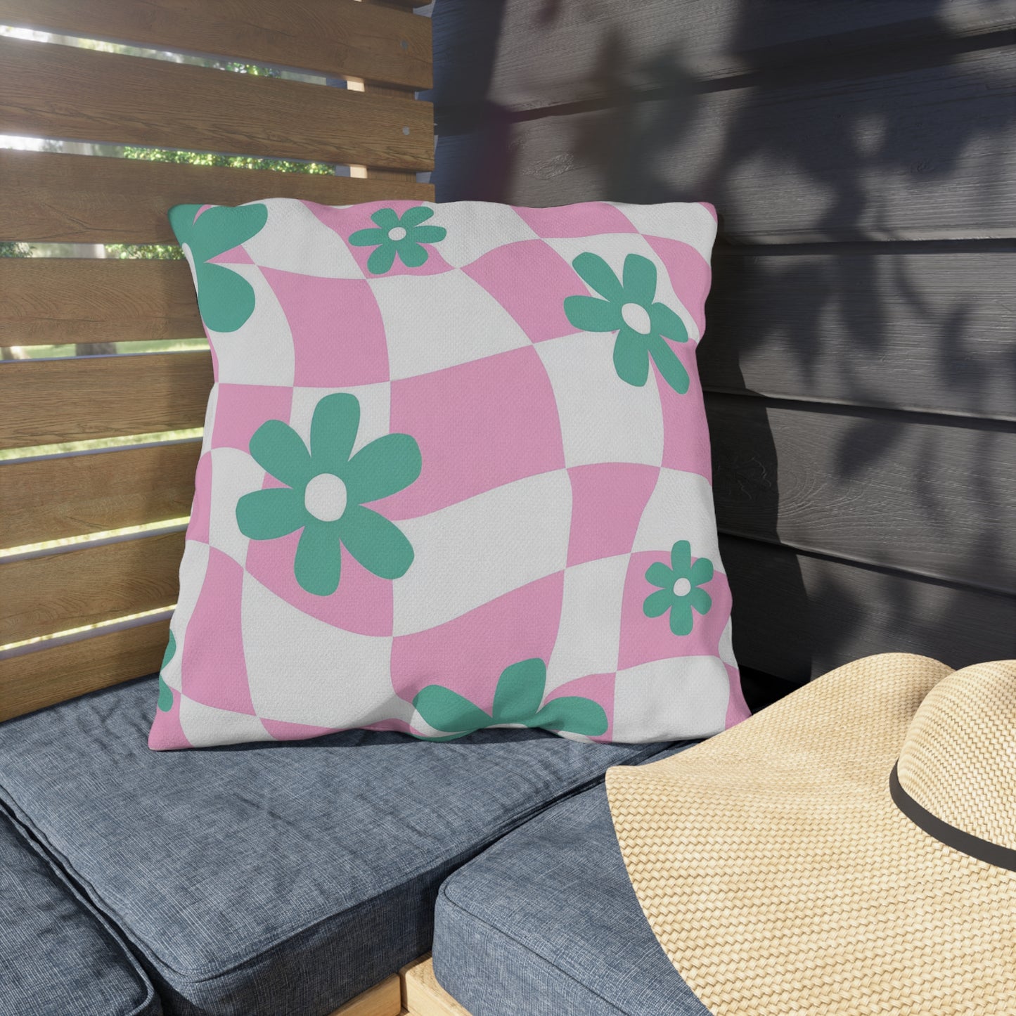 Vibrant floral pillow designed to add cheerful style to patios and balconies.