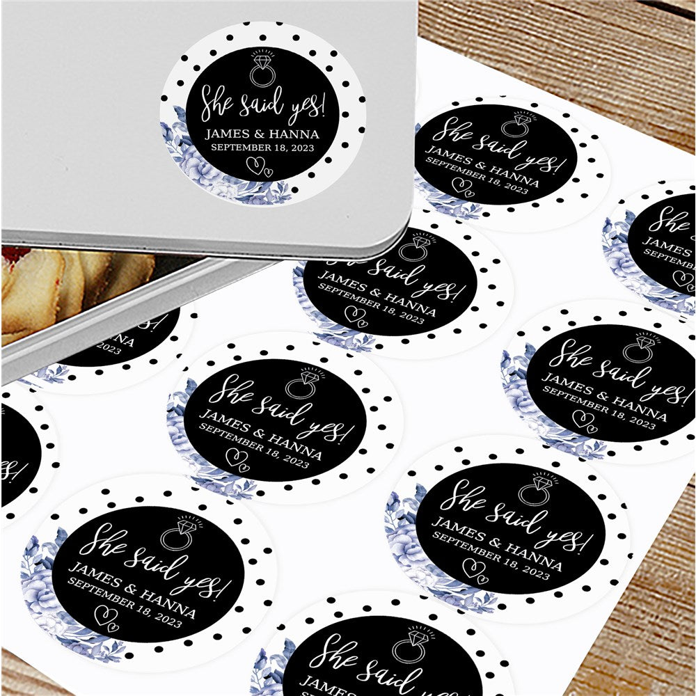 Personalized round engagement labels featuring 'She Said Yes' with couple's names and date. Perfect for wedding favors, gifts, and party decor.