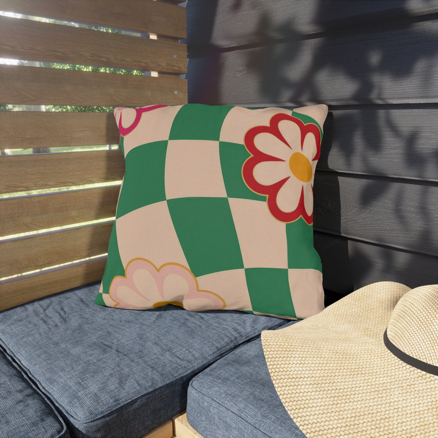 Durable polyester pillow with flower design used on a patio chair