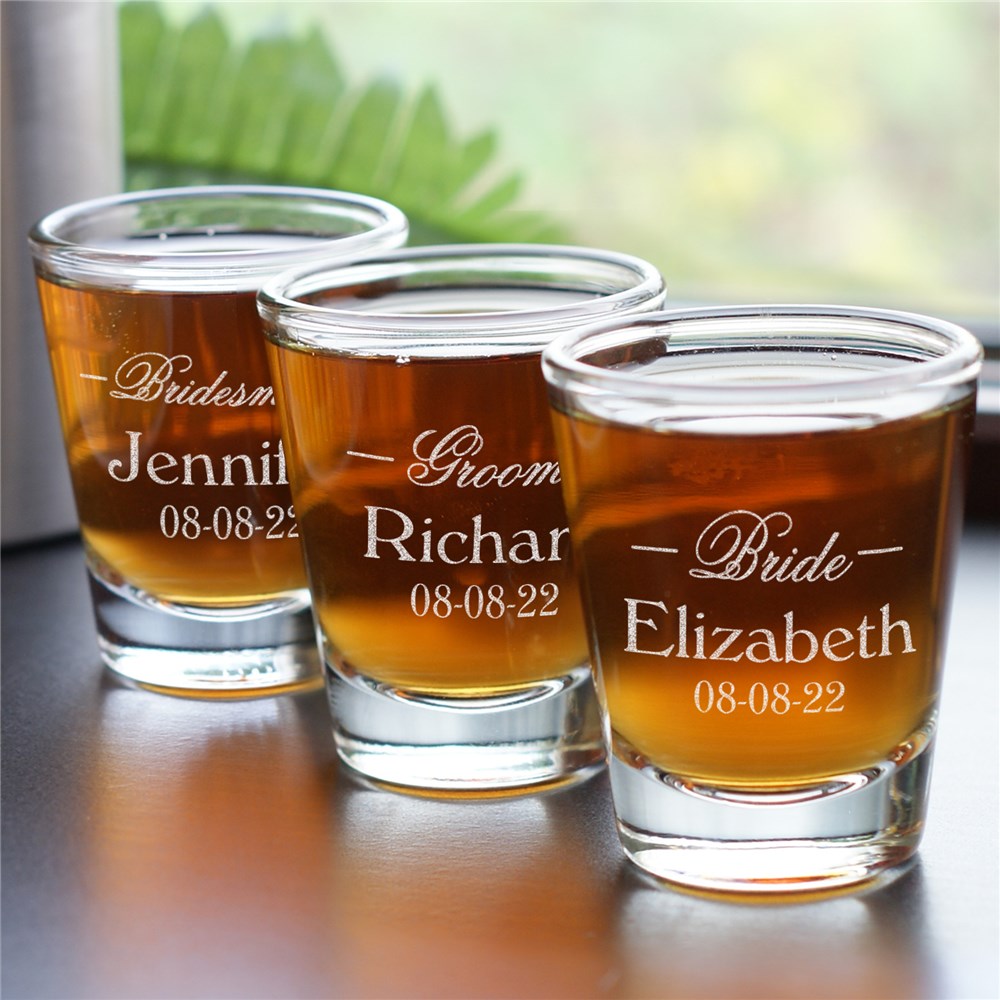 Clear glass shot glass engraved with title, name, and wedding date for bridal party or family keepsake