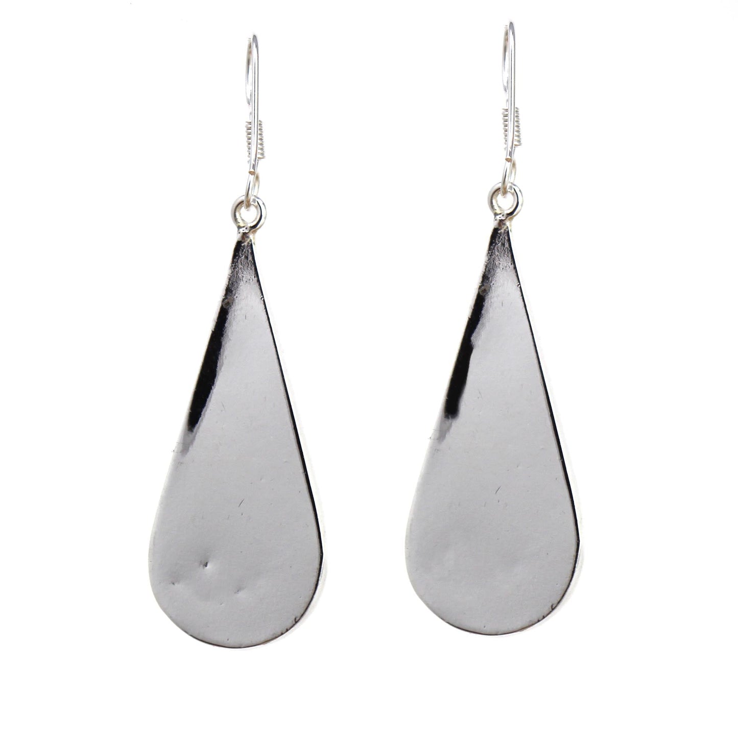 Unique artisan earrings with tropical shell accents and silver hardware