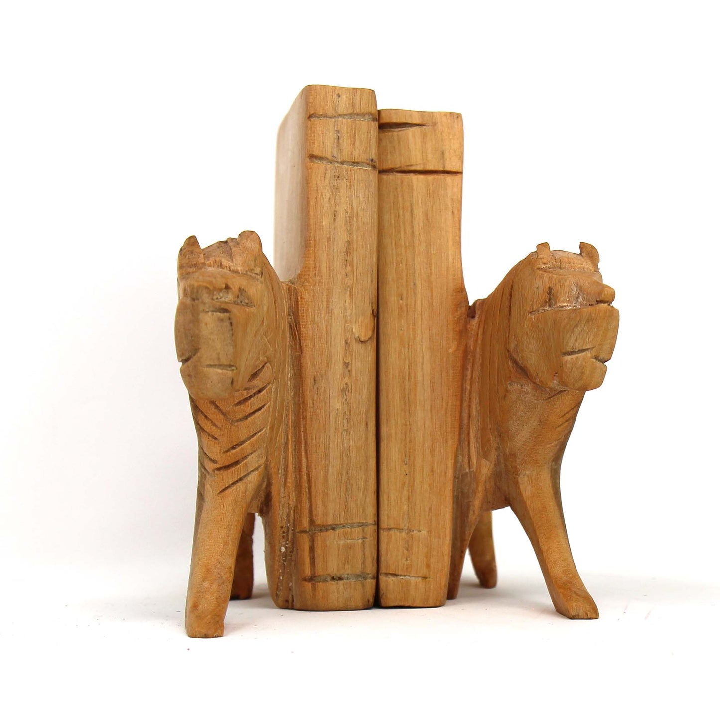 Detailed hand-carved wooden lion head used as bookend