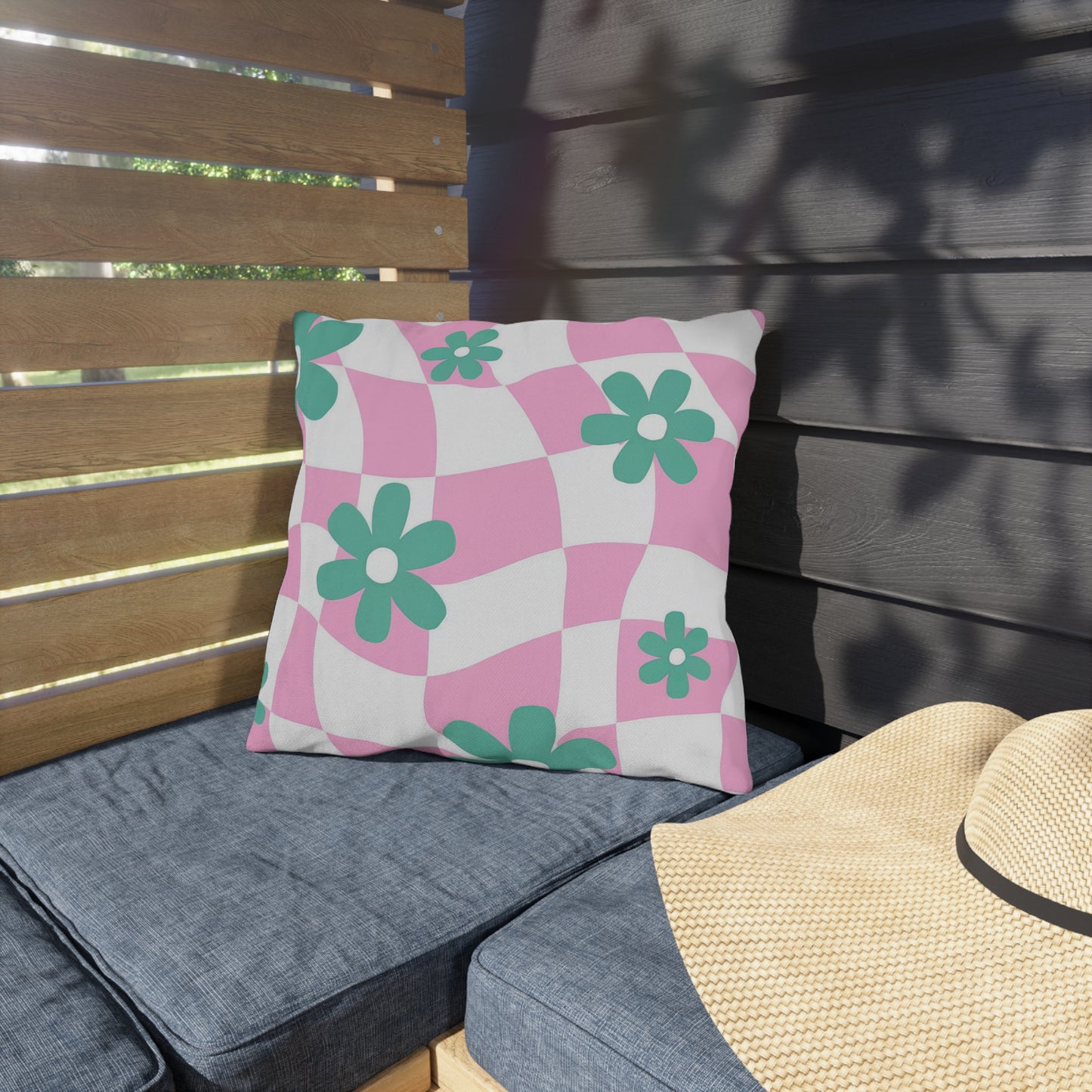 Decorative pillow with blooming floral design made for outdoor relaxation.