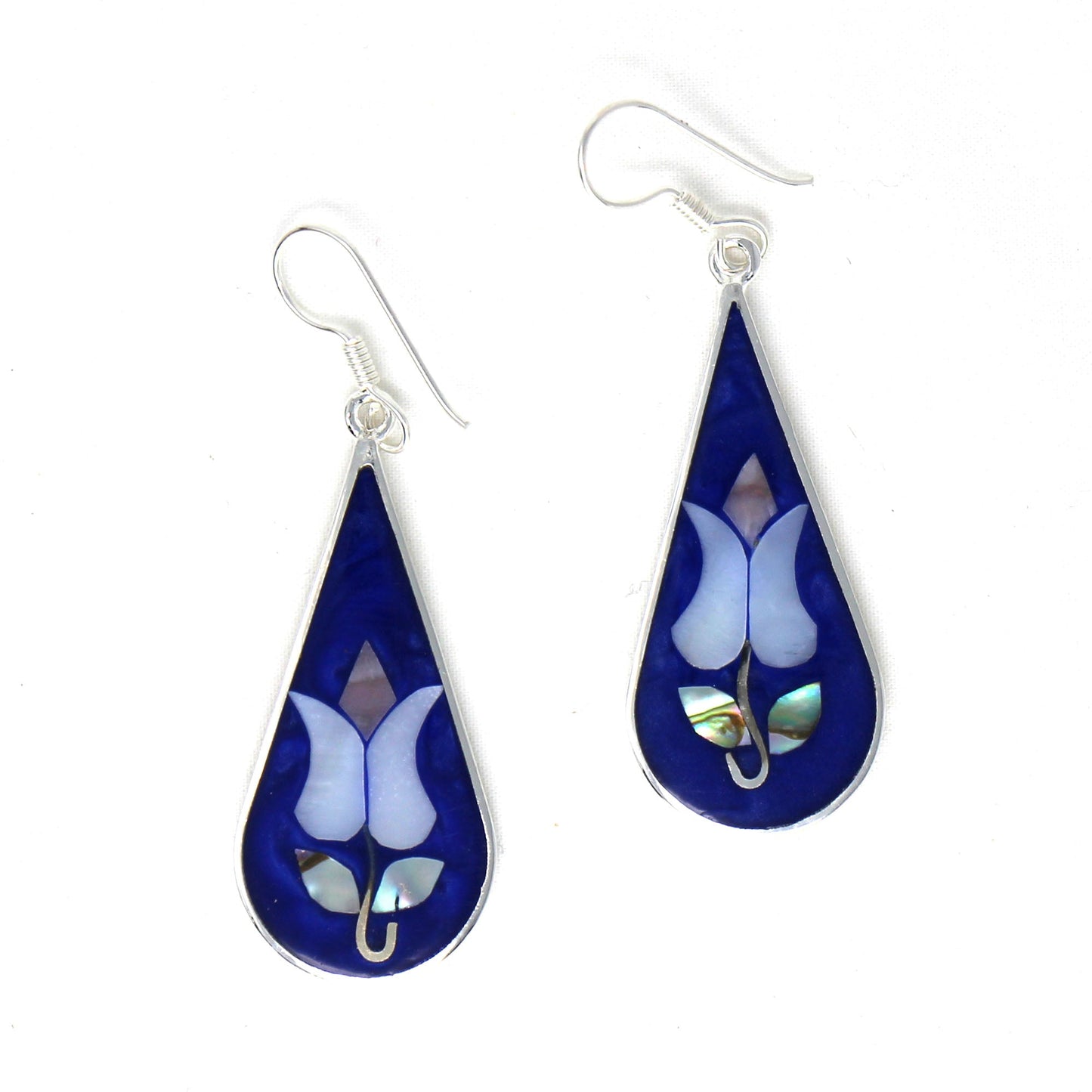 Close-up of natural abalone shell detailing in teardrop earrings
