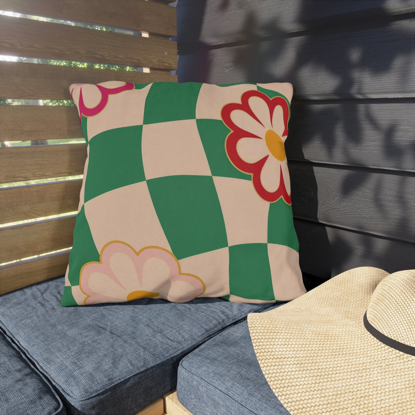 Square decorative cushion with colorful floral pattern for balcony seating