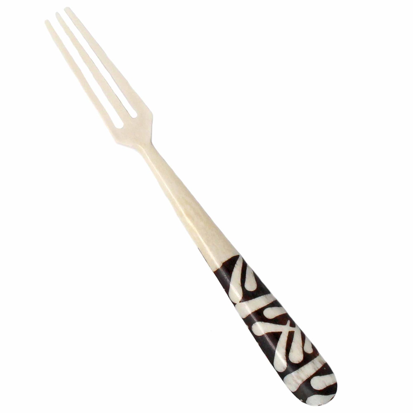 Close-up of intricate batik patterns on appetizer forks