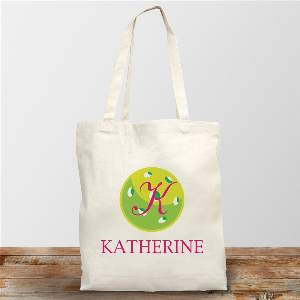 Personalized pickleball tote bag with initial and name in black print on natural cotton fabric
