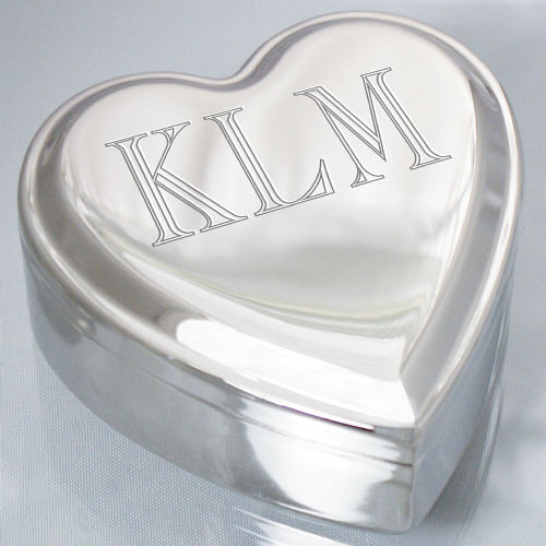 Silver heart-shaped engraved jewelry box with personalized name and blue felt lining