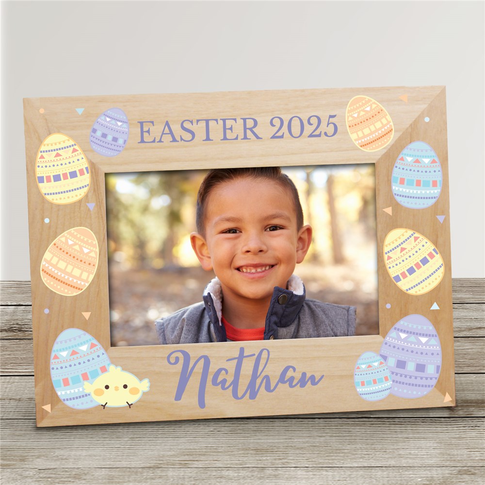 A wooden Easter picture frame with a custom name and message, designed to hold a cherished holiday photo.