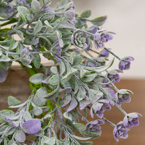 Dusk lavender spring floral candle wreath with soft botanical texture