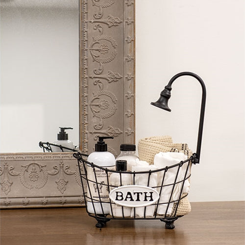 Freestanding vintage clawfoot metal tub for bathroom organization