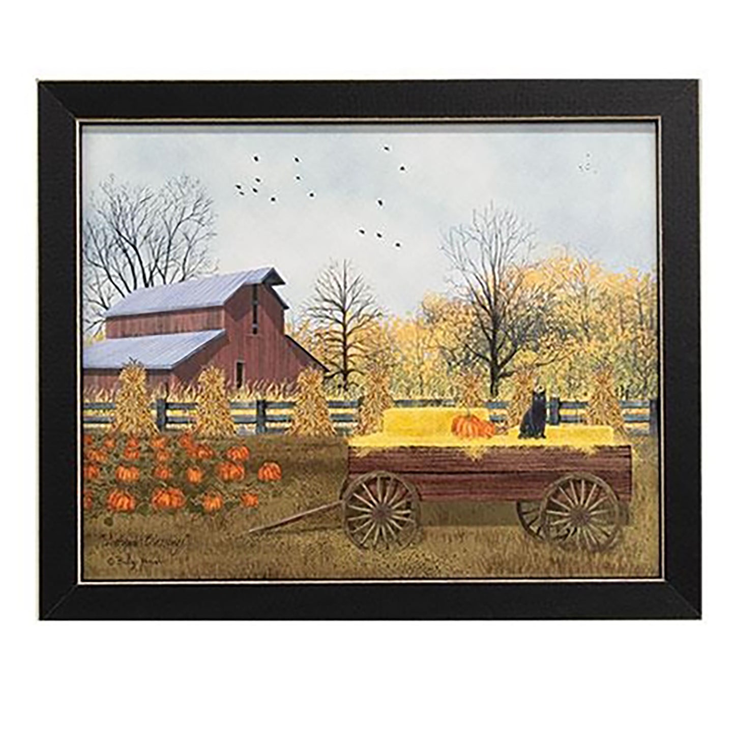 Framed artwork of a rural scene with a red barn, wagon, and pumpkins.