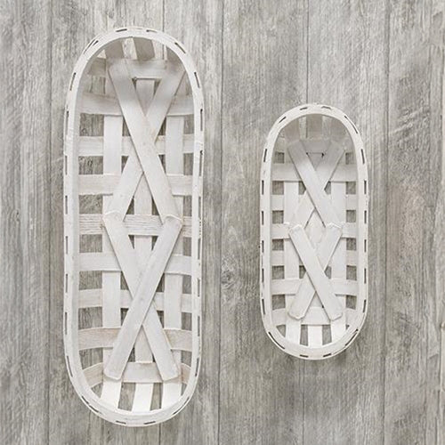 Close-up of distressed white wood basket texture and woven crisscross detail.