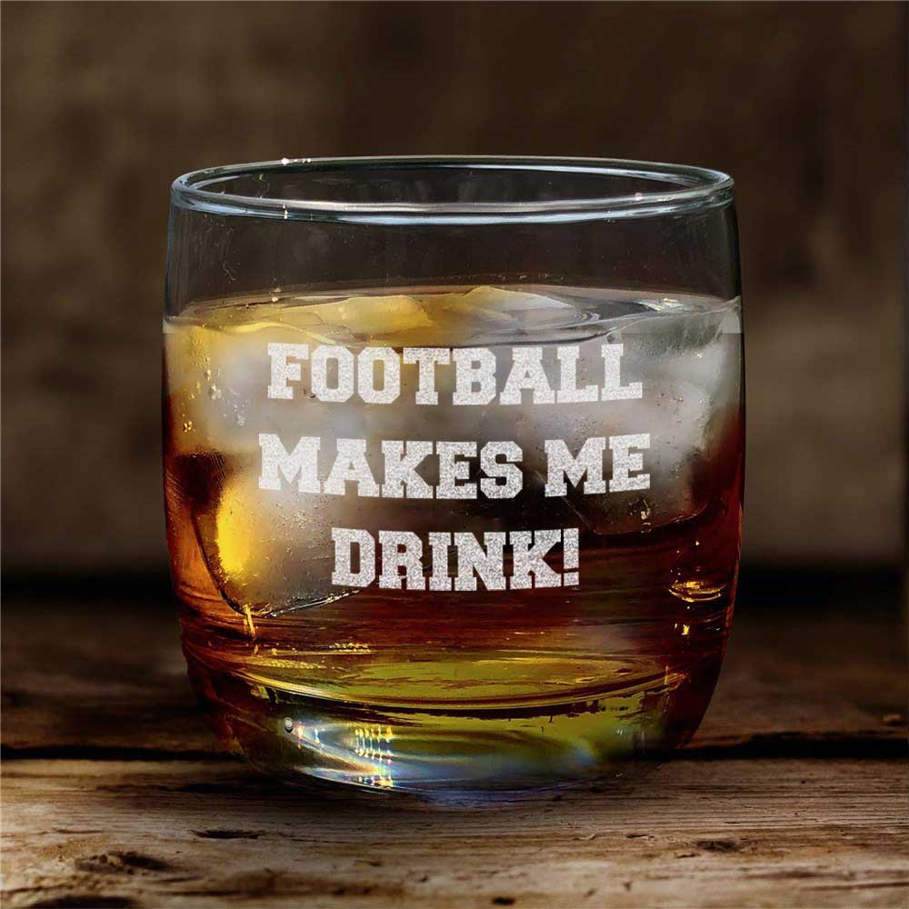 Personalized whiskey rocks glass with engraved custom message in bold font
