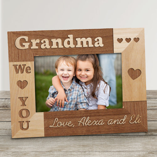 Custom wood photo frame with "I Love Grandma" message and engraved name