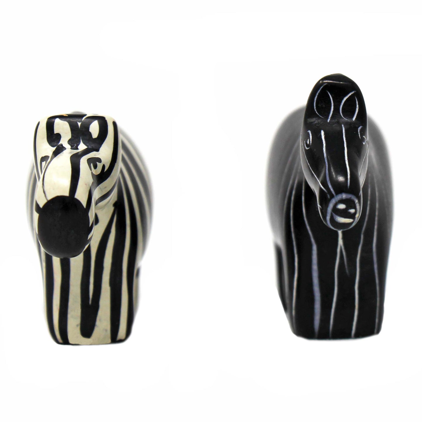 Small soapstone zebras with opposing finishes for balanced decor