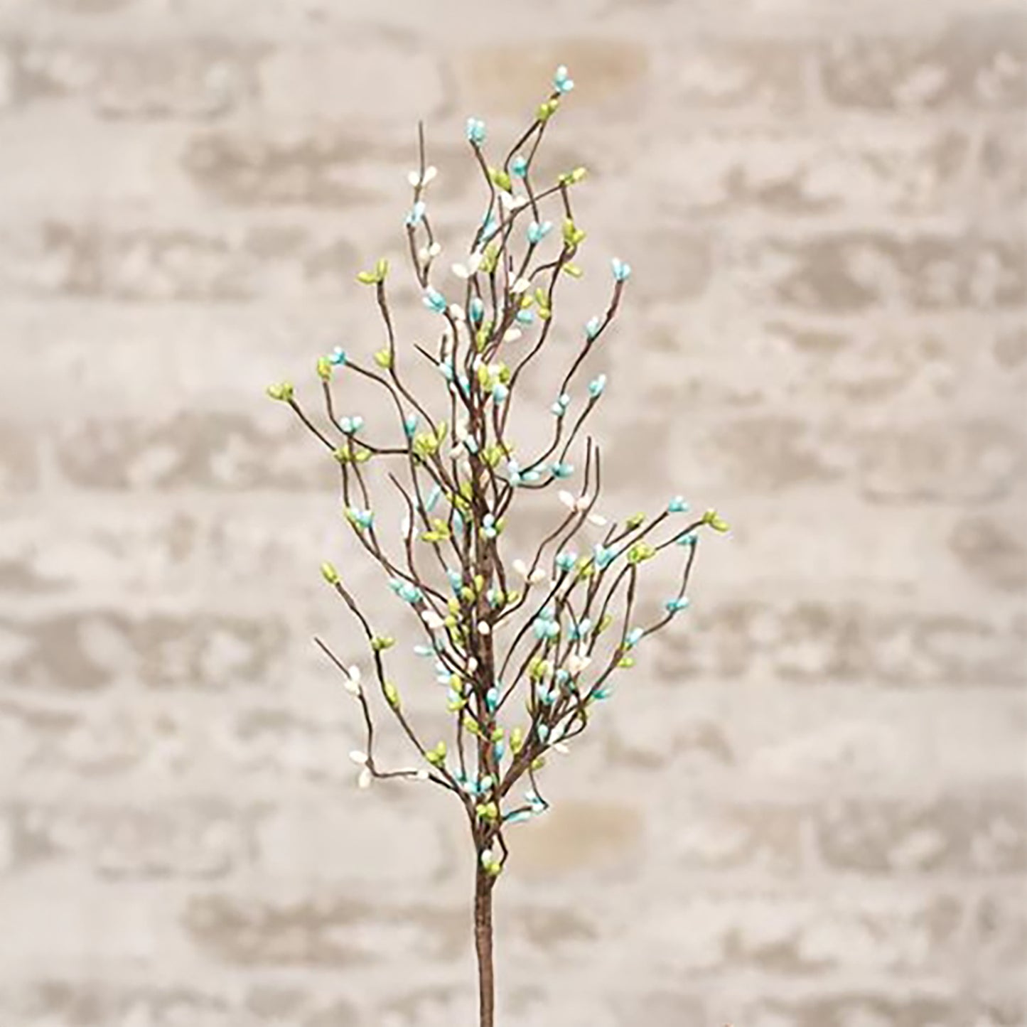 Pastel pip berry spray with teal, green, and ivory berries on a rustic brown stem for spring farmhouse decor