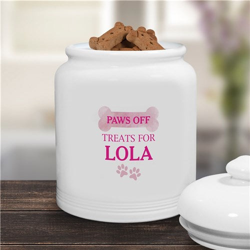 Personalized pet treat container with airtight lid and paw print accents