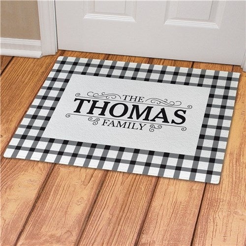 Custom printed name doormat with a classic plaid design. Available in multiple sizes and colors, perfect for home or gift-giving.