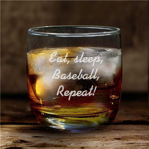 Closeup of rocks glass with etched custom message in Modern Print font