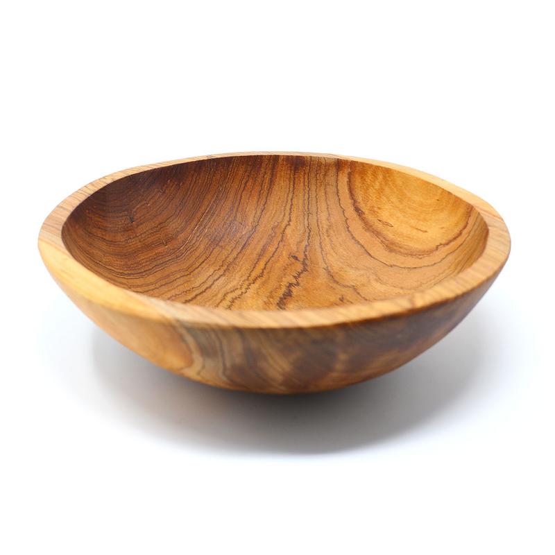 Hand-carved olive wood bowl, crafted in Kenya with a unique natural grain.