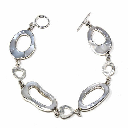 Handcrafted bracelet with shimmering mother-of-pearl circle links and alpaca silver