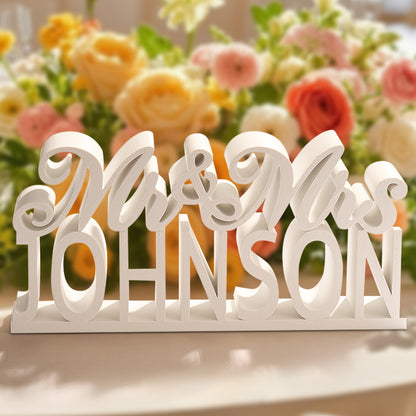 A 3D printed "Mr. & Mrs." table sign, showcasing the customizable design where the customer can submit their last name for a personalized touch.