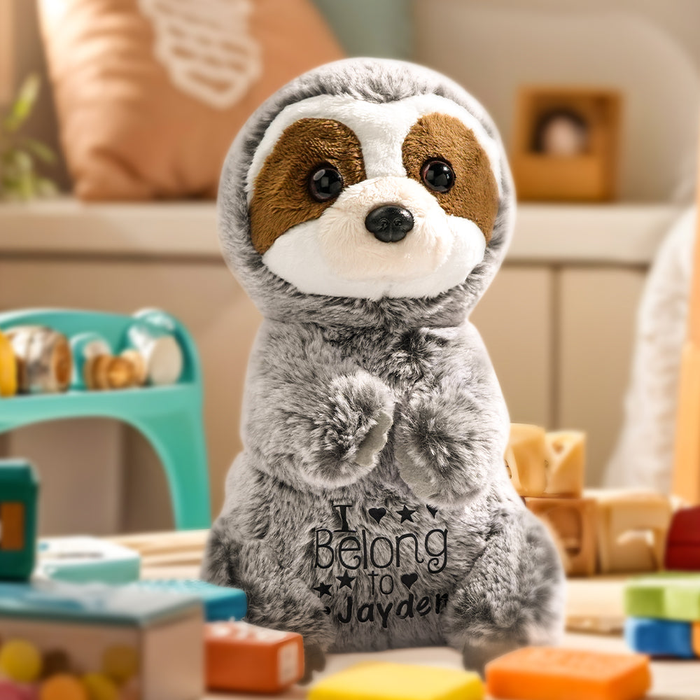 A close-up view of the personalized sloth plush toy, featuring a soft and cuddly sloth design with the baby’s name embroidered, offering a special touch for playtime, bedtime, or nursery decor.