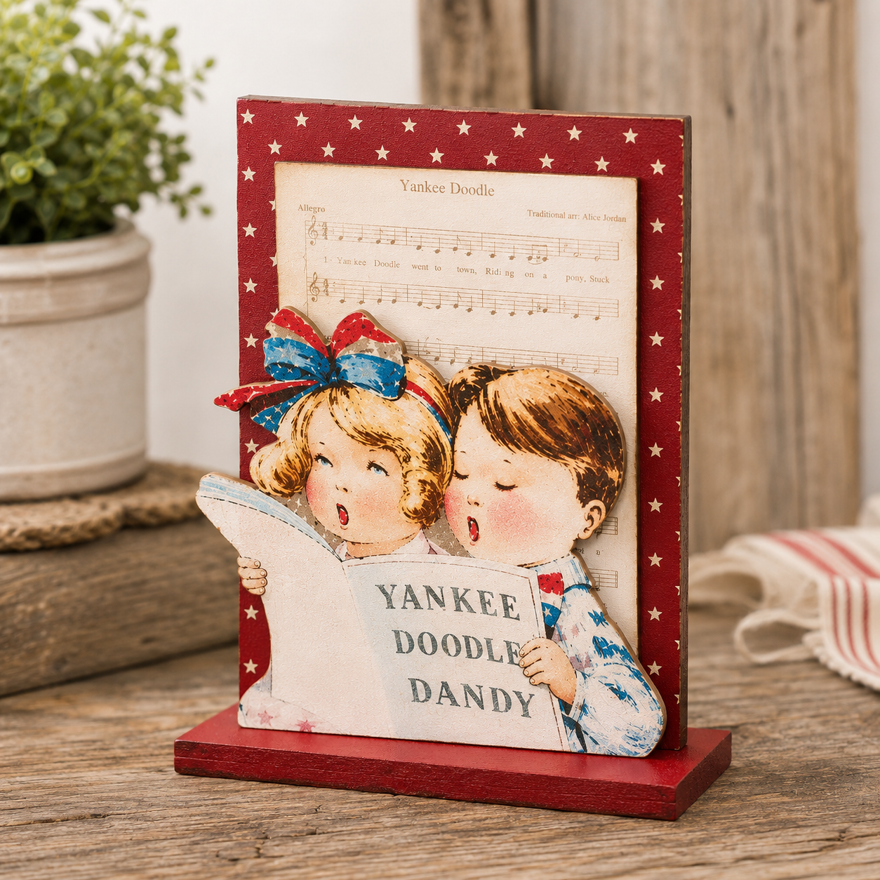 Yankee Doodle kids wooden Americana figure with vintage patriotic artwork, sheet music design, nostalgic Americana styling, and primitive country decor accents