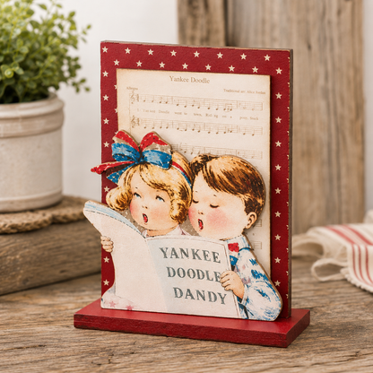 Yankee Doodle kids wooden Americana figure with vintage patriotic artwork, sheet music design, nostalgic Americana styling, and primitive country decor accents
