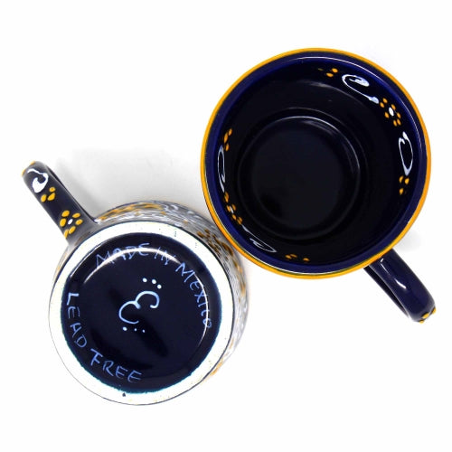 Stacked flared coffee mugs with vibrant blue glaze, a beautiful blend of tradition and functionality.