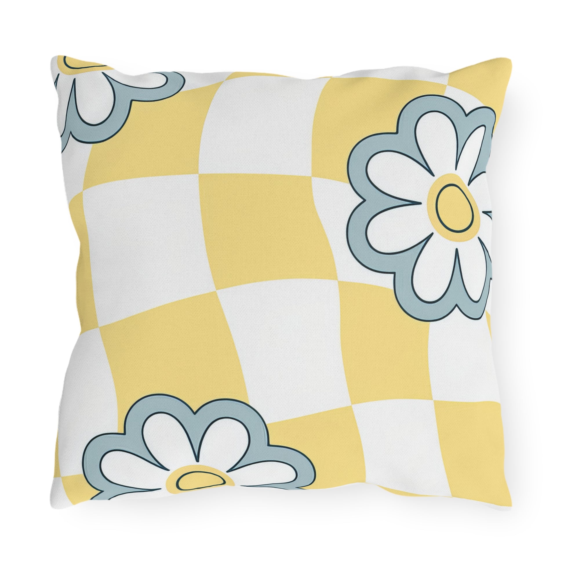 Stylish outdoor pillow in yellow, white, and blue for spring and summer patio decor