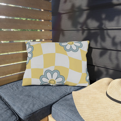 Outdoor lumbar pillow with cheerful yellow and white base and floral design