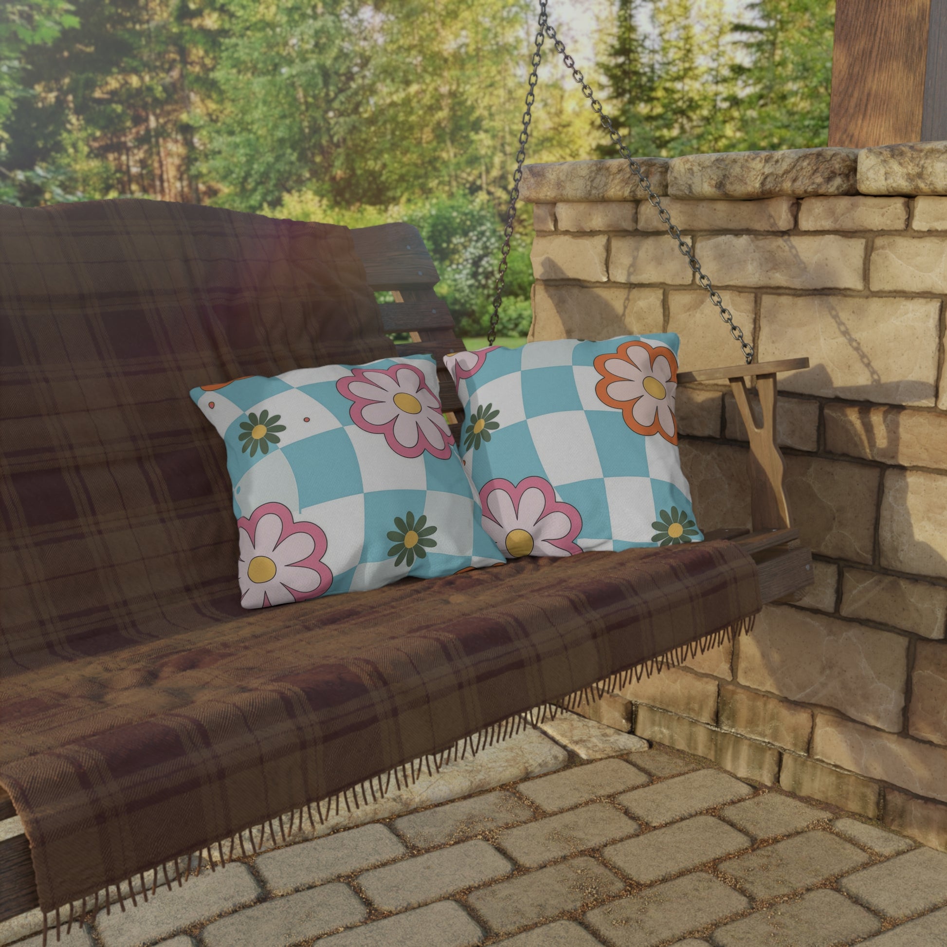 Cheerful garden pillow with multi-color floral print in backyard setup