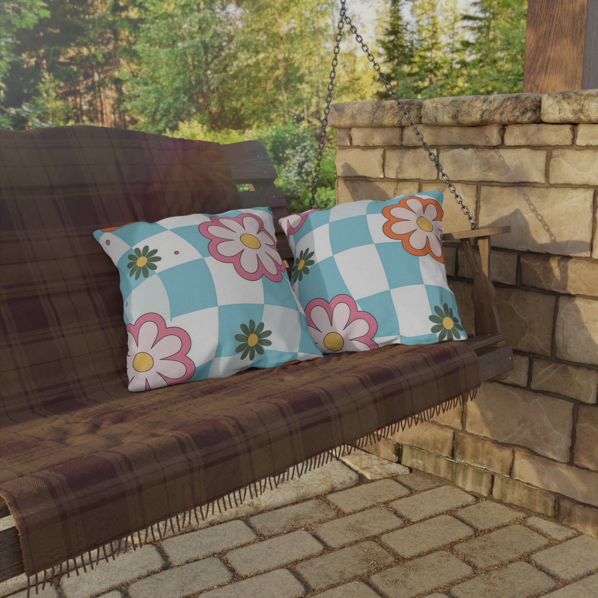 Decorative throw pillow with vivid floral pattern on porch swing