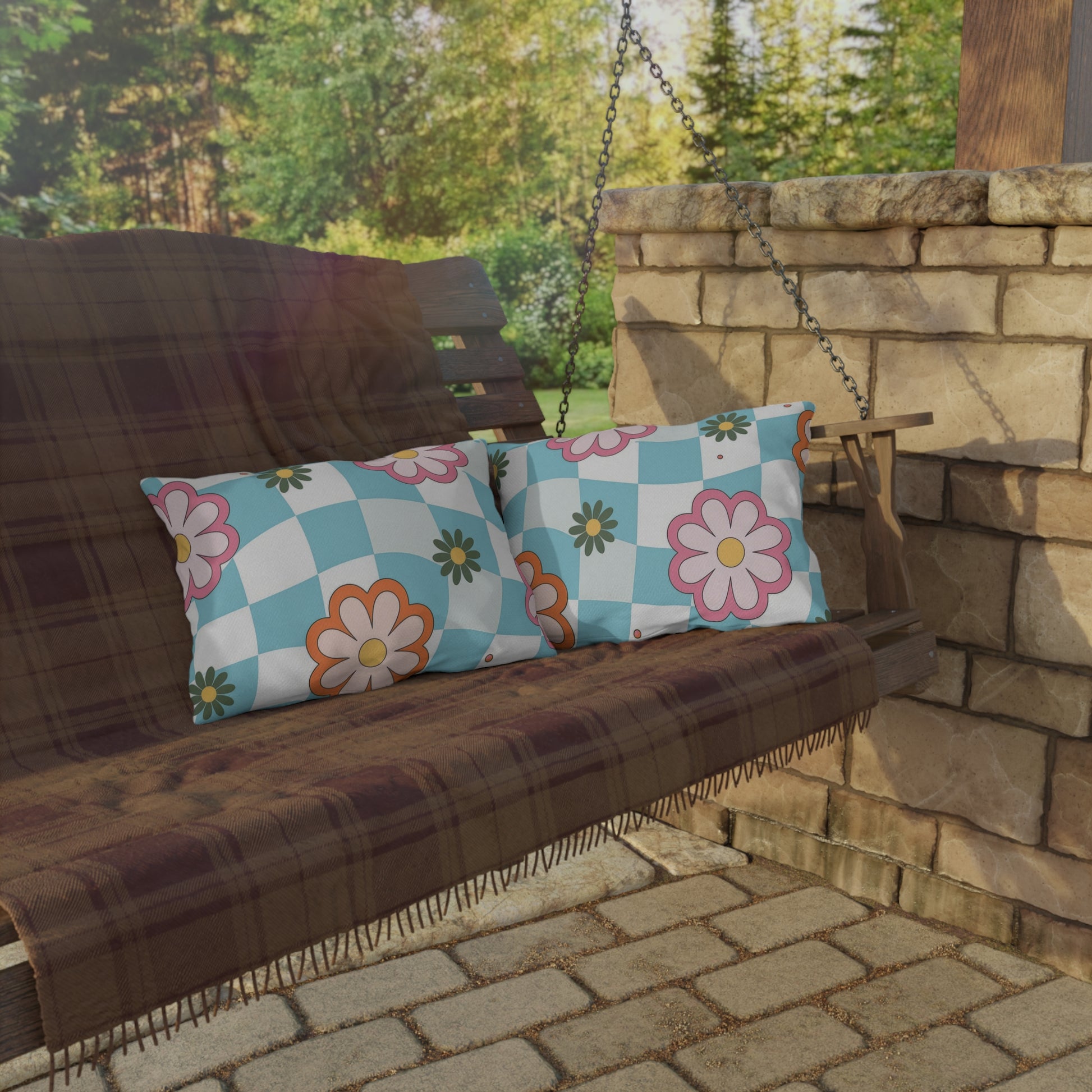 Decorative lumbar pillow with colorful botanical pattern in a bright garden setup