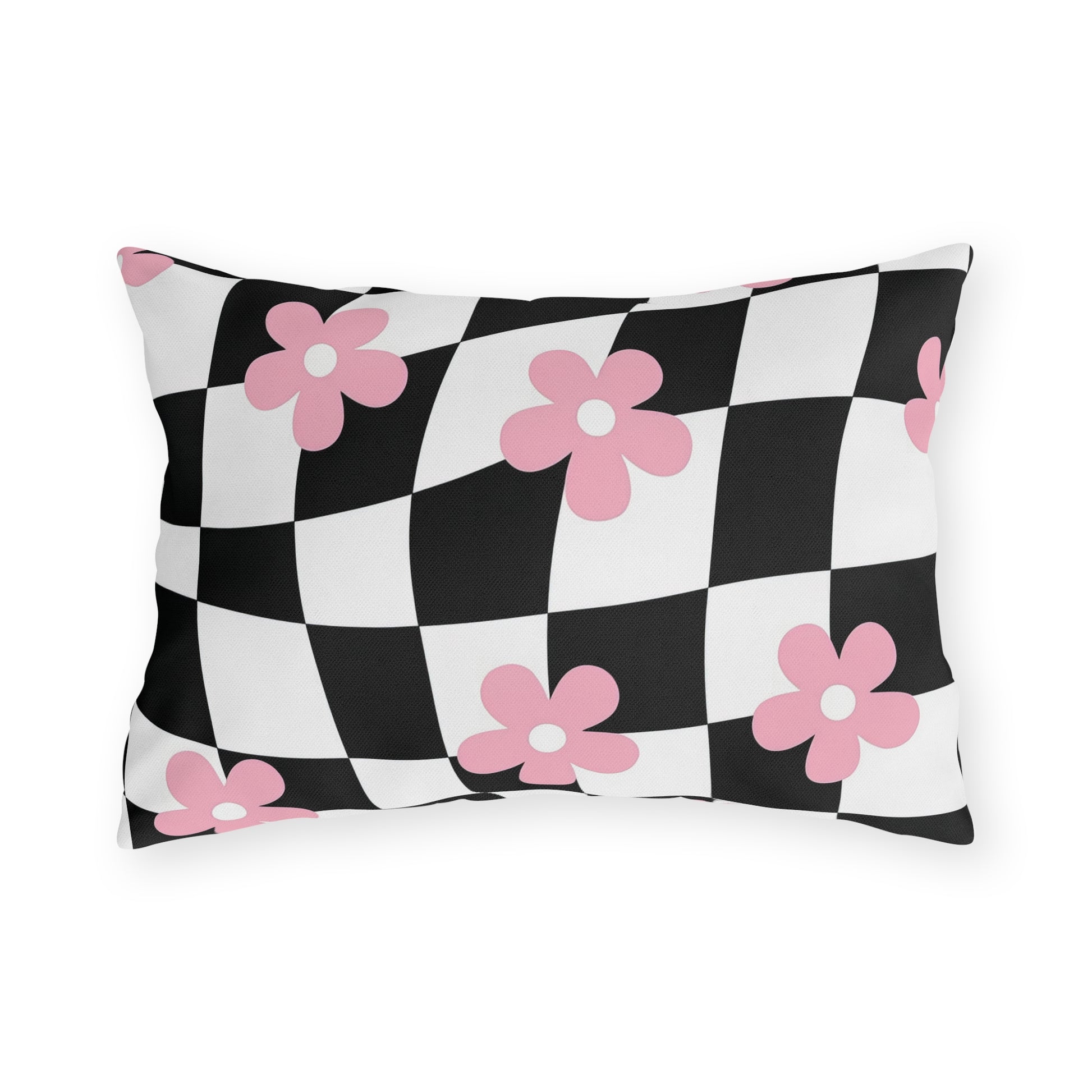 Decorative lumbar pillow with pink and white floral print on black and white checkered background