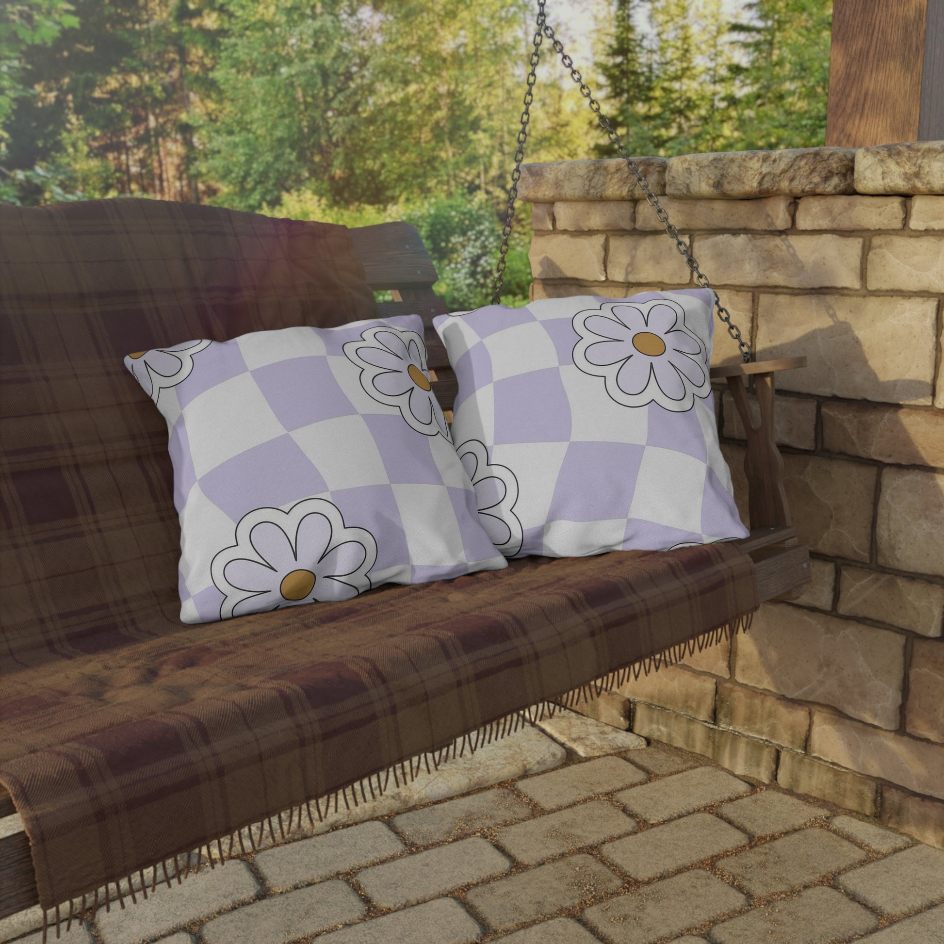 UV- and water-resistant square pillow with checkered floral pattern in purple and orange