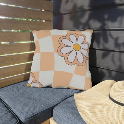 Sunshine daisy pillow styled on porch seating with greenery