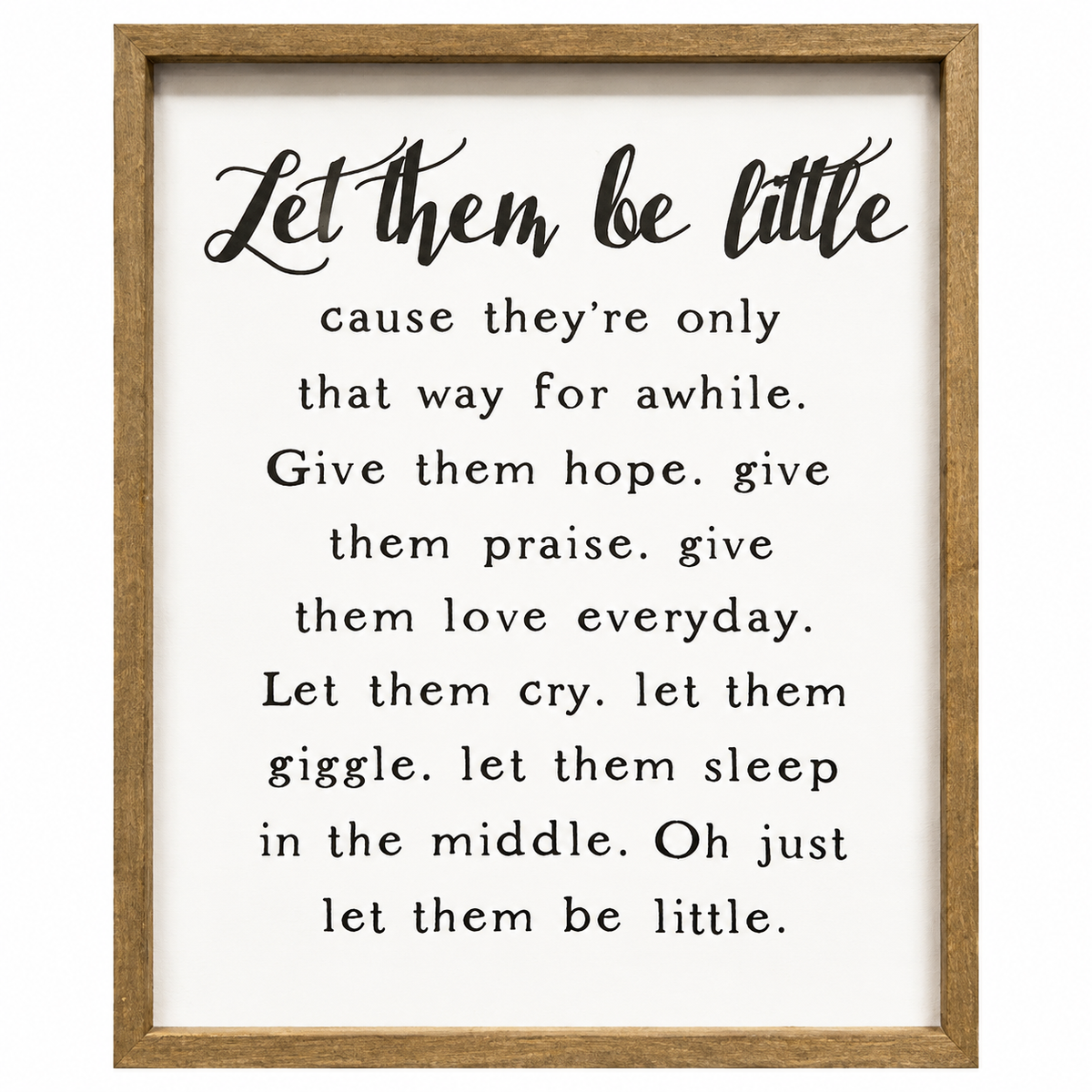 Framed nursery wall art featuring the quote 'Let them be little' in black script and serif text on a white background, enclosed in a light natural wood frame.