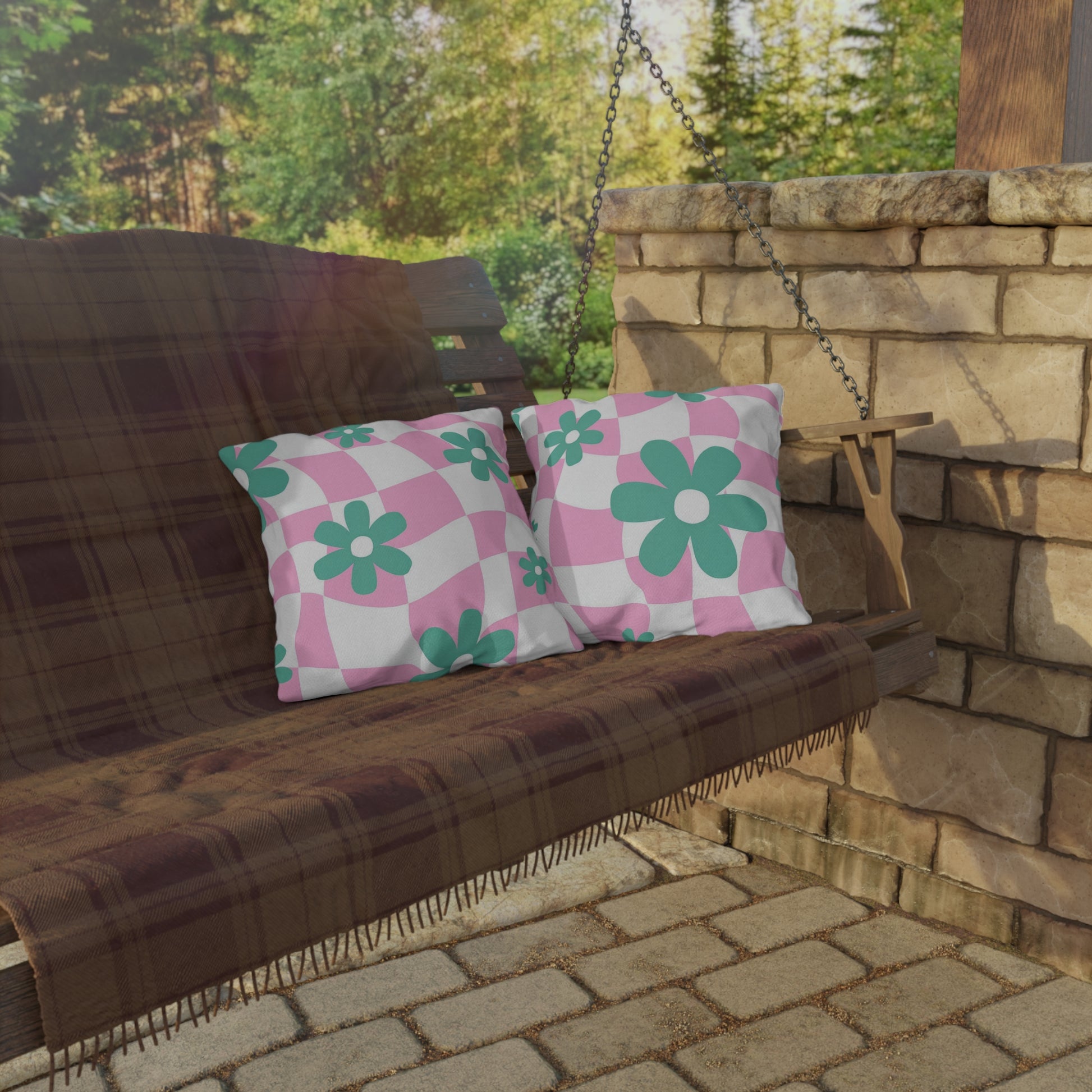 Water-resistant polyester outdoor pillow with a pastel garden pattern.