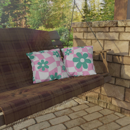 Water-resistant polyester outdoor pillow with a pastel garden pattern.
