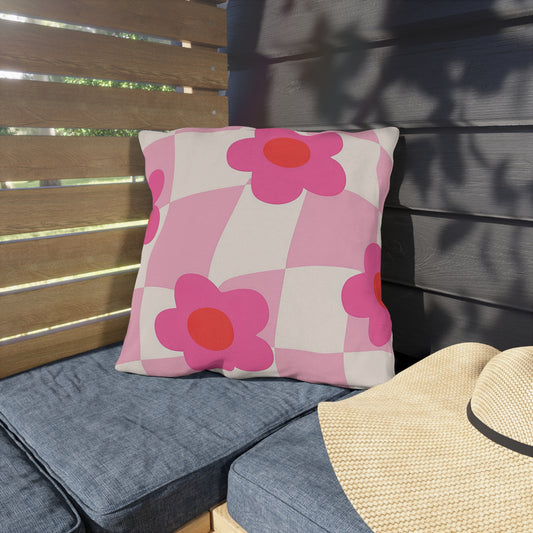 Colorful floral outdoor pillow designed for patios and garden seating