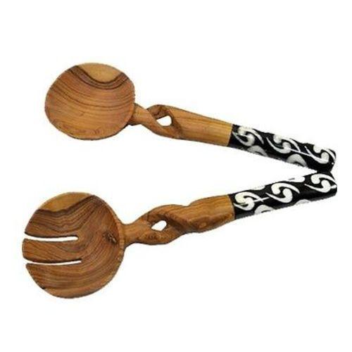 Fair trade wooden salad servers with African-inspired batik bone handles for elegant dining.