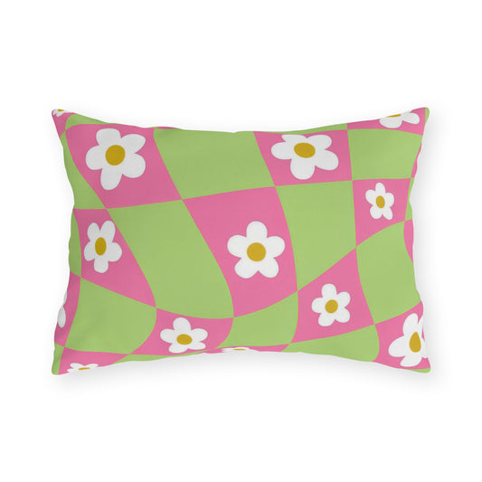 Cheerful floral lumbar pillow featuring pink and green flower pattern on a durable outdoor fabric