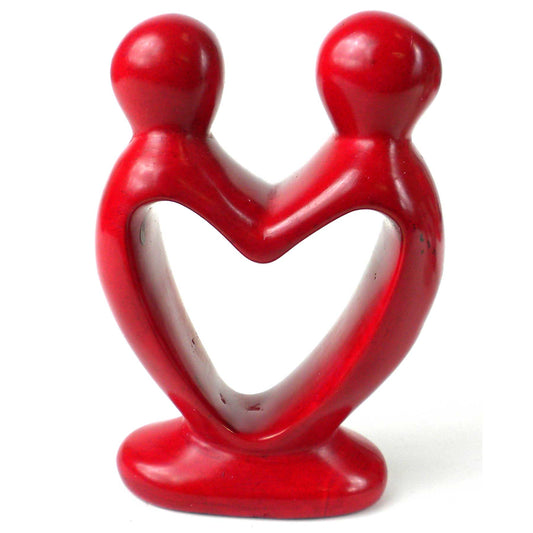 Hand-carved red soapstone sculpture of two lovers forming a heart shape