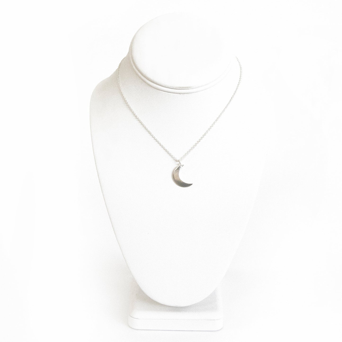 Delicately brushed silver crescent moon pendant on a minimalist chain, Fair Trade jewelry.