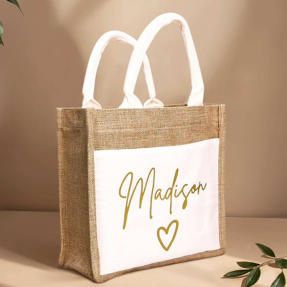 A studio photo of the personalized jute tote bag, showcasing its durable linen fabric, spacious design, and convenient front pocket.